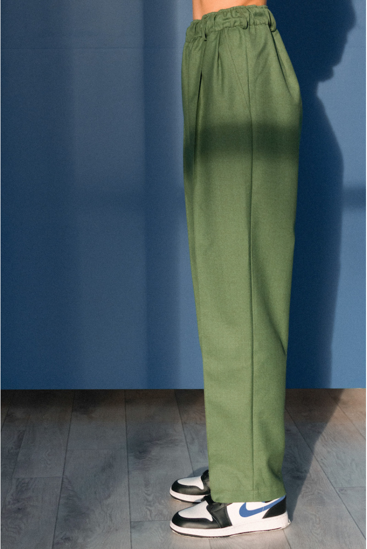 Green trousers with a wool elastic band